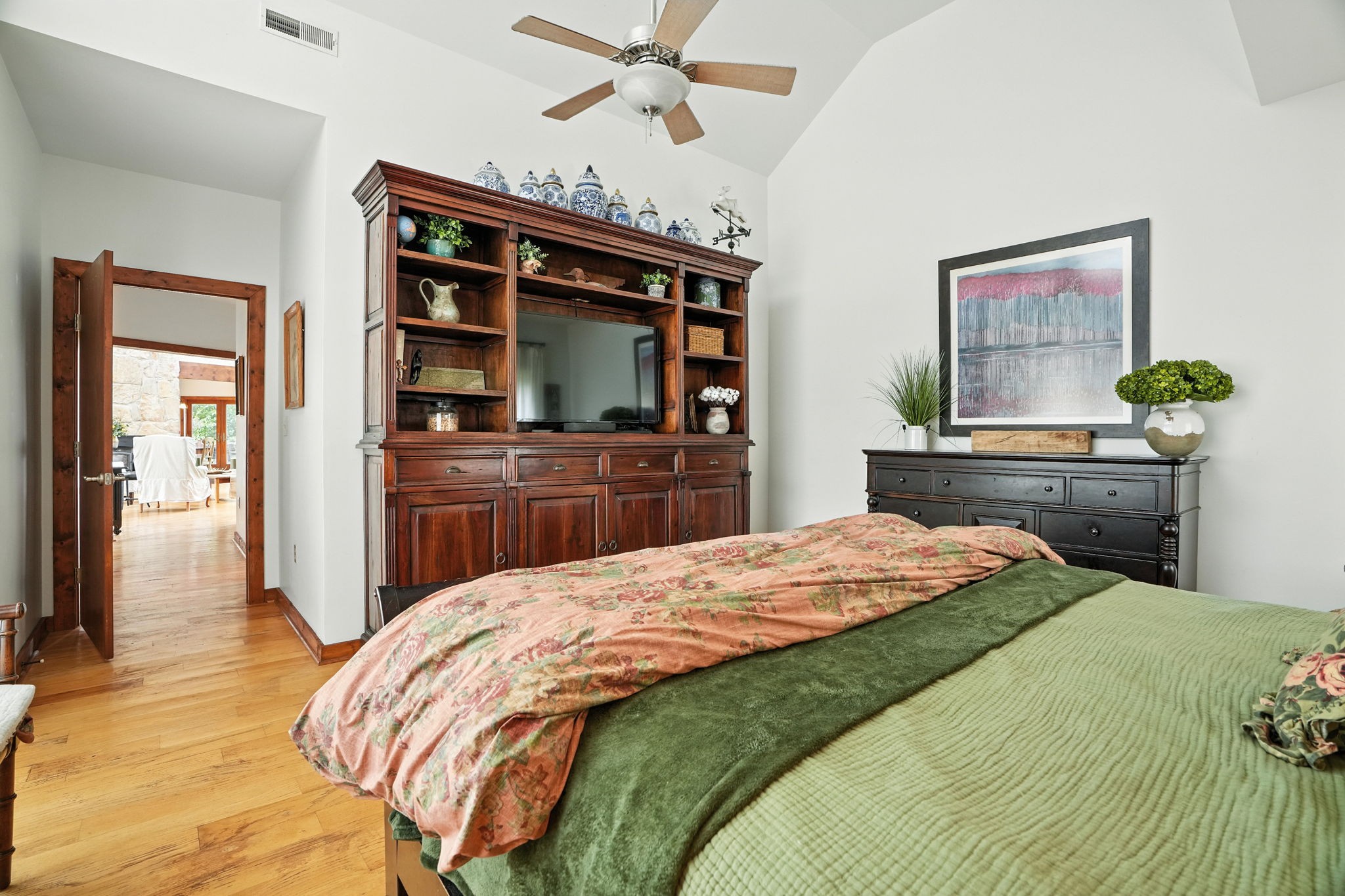 4445 Hurricane Ridge Road Smithville, TN 37166 - Photo 36 of 84 a bedroom with a bed and a dresser
