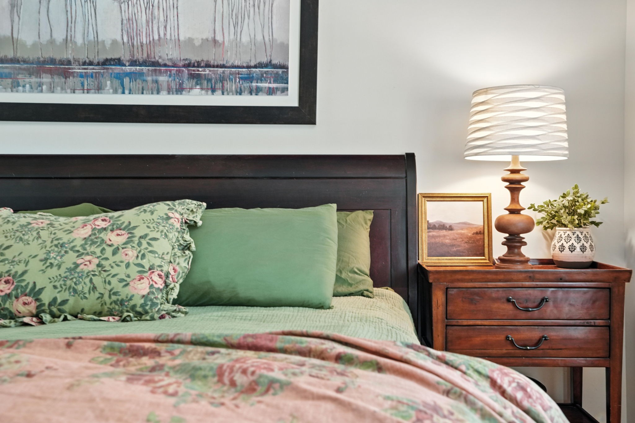 4445 Hurricane Ridge Road Smithville, TN 37166 - Photo 37 of 84 a bedroom with a bed and a potted plant