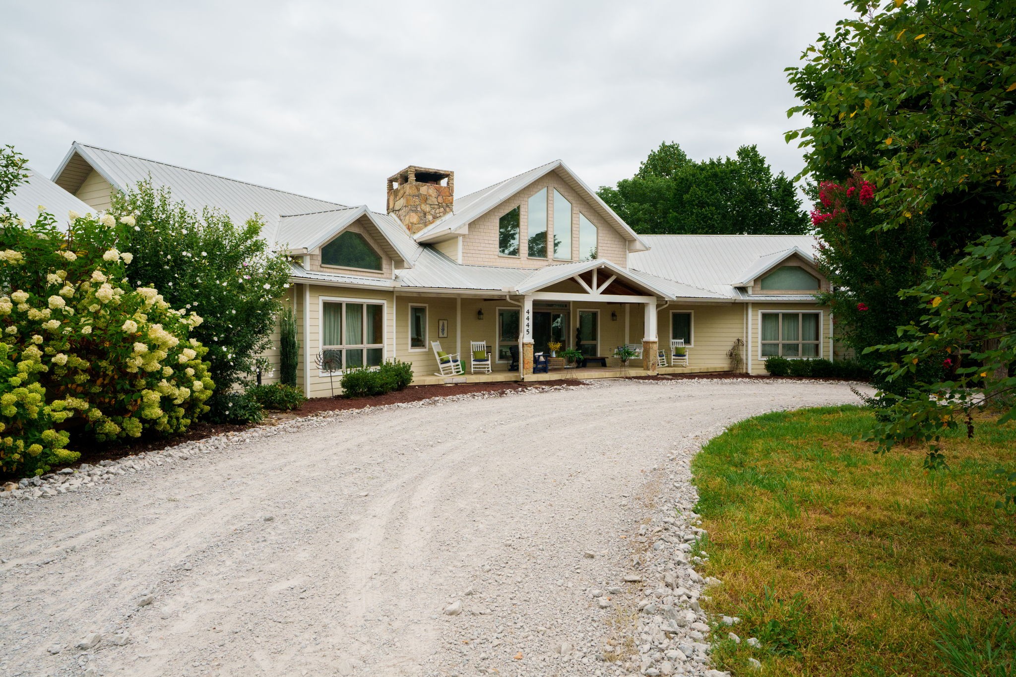 4445 Hurricane Ridge Road Smithville, TN 37166 - Photo 4 of 84 a front view of a house with a yard