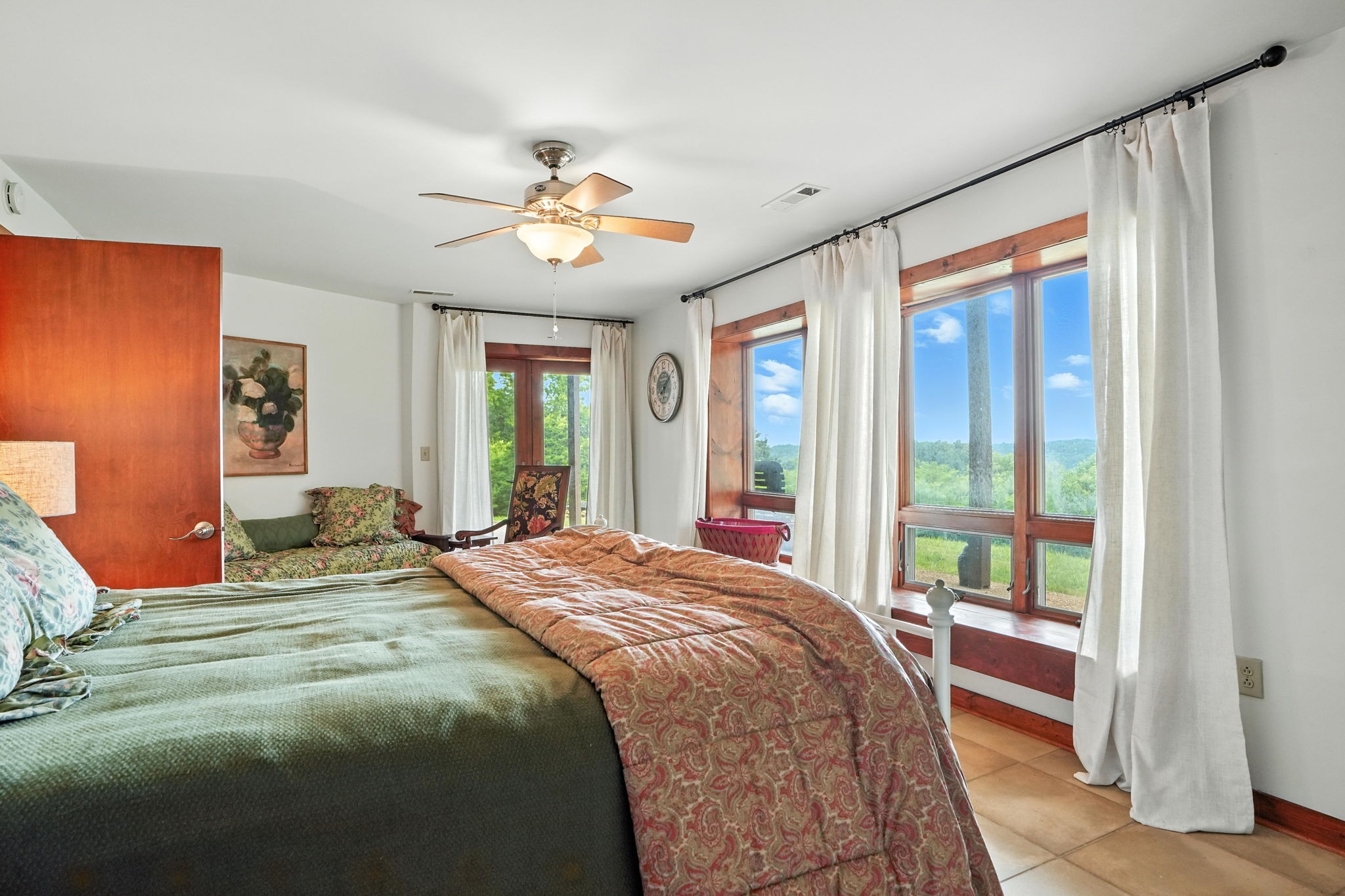 4445 Hurricane Ridge Road Smithville, TN 37166 - Photo 46 of 84 a bedroom with a large bed and a large window