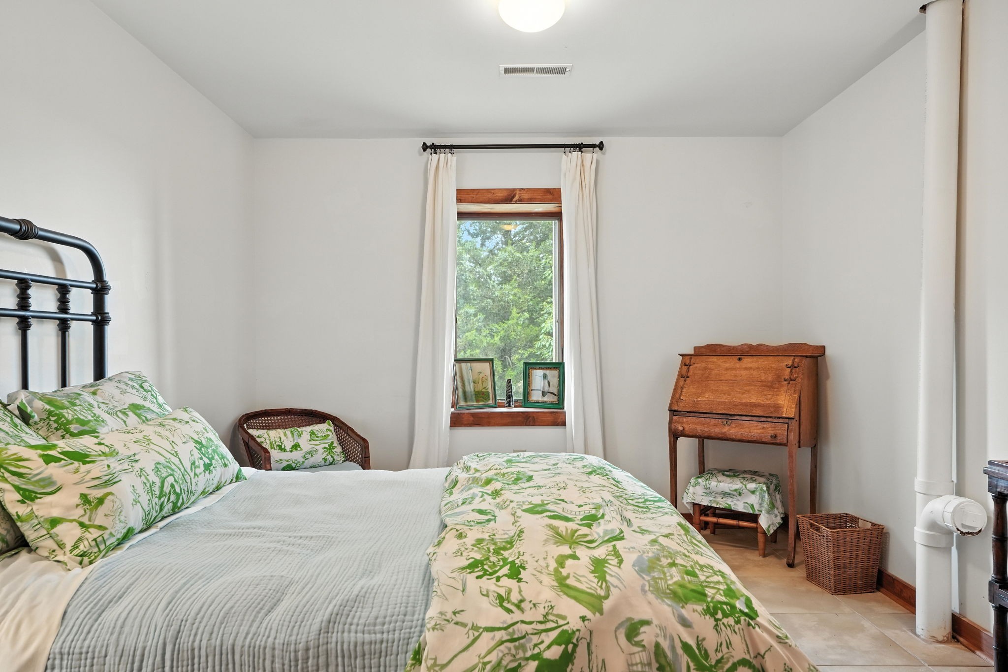 4445 Hurricane Ridge Road Smithville, TN 37166 - Photo 51 of 84 a bedroom with a bed and a window