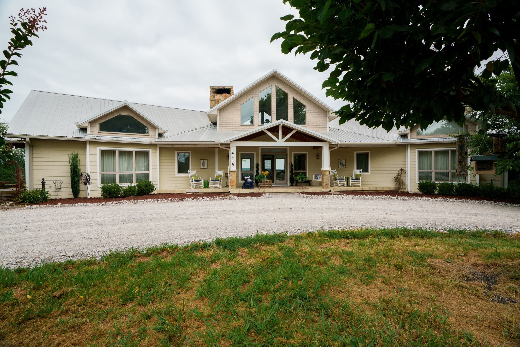 4445 Hurricane Ridge Road Smithville, TN 37166 - Photo 7 of 84 a front view of a house with a yard