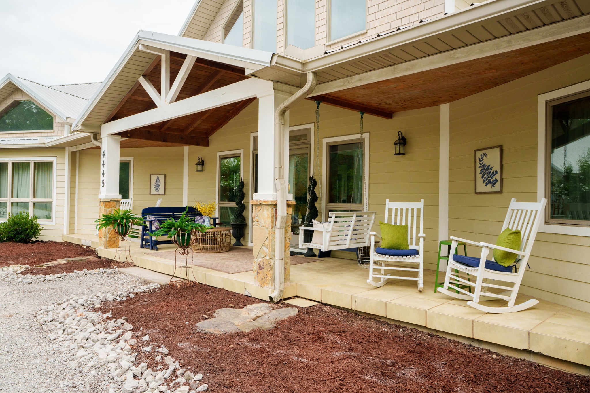 4445 Hurricane Ridge Road Smithville, TN 37166 - Photo 8 of 84 a view of a patio with table and chairs near a barn