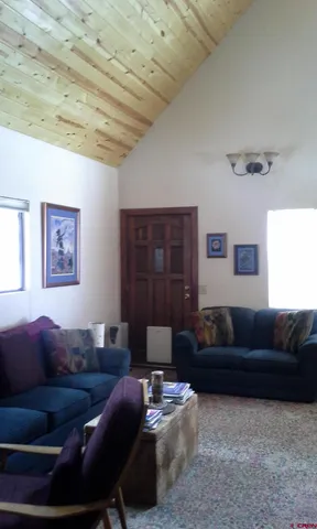 a living room with furniture and a couch