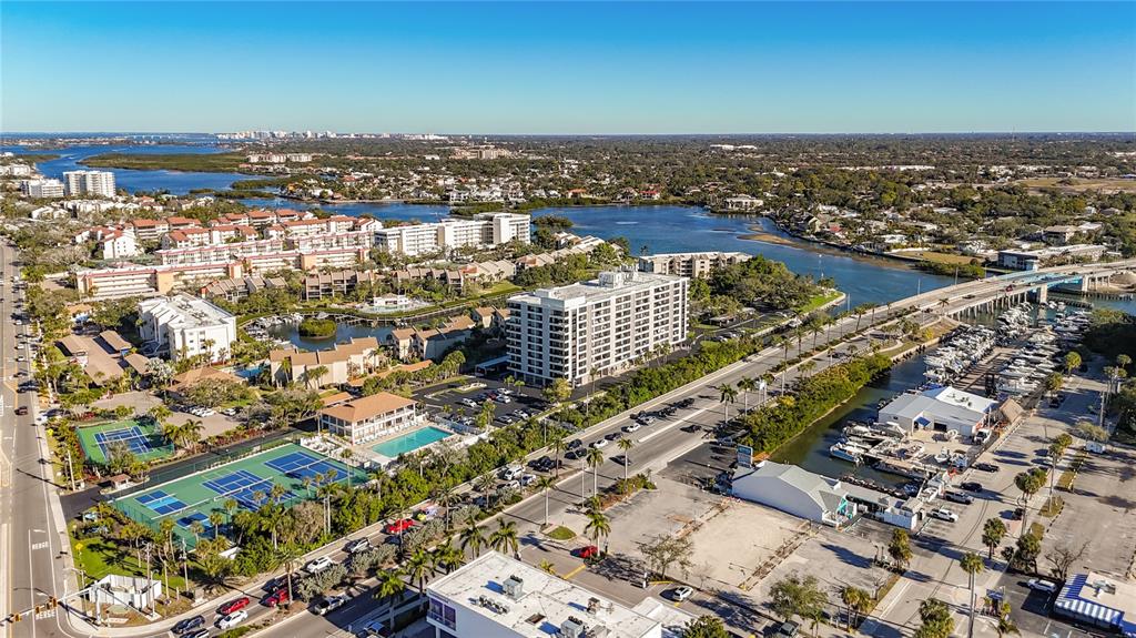 an aerial view of city and lake