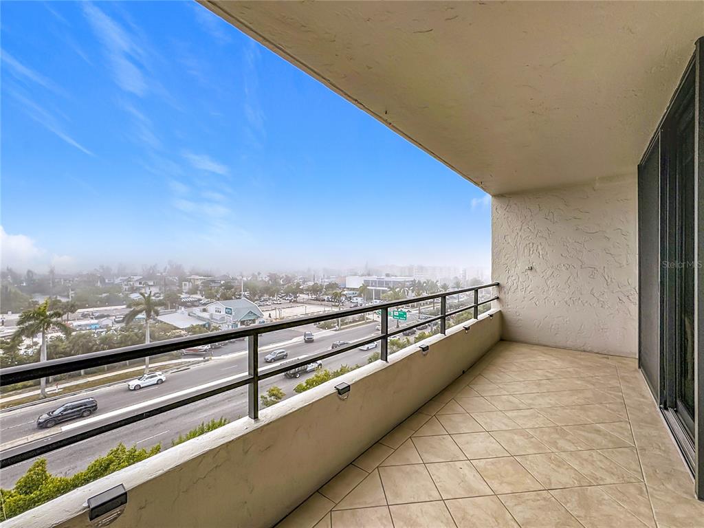 6415 Midnight Pass Road, Unit 705 Sarasota, FL 34242 - Photo 27 of 44 a view of balcony with furniture