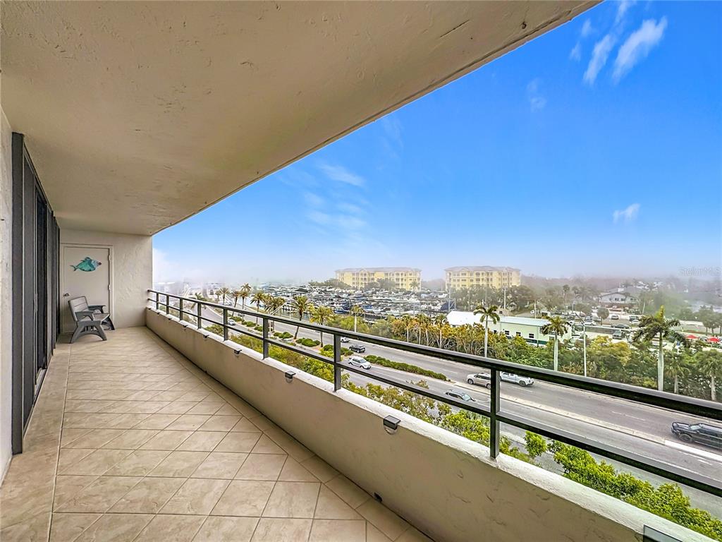 6415 Midnight Pass Road, Unit 705 Sarasota, FL 34242 - Photo 29 of 44 a view of balcony with city view