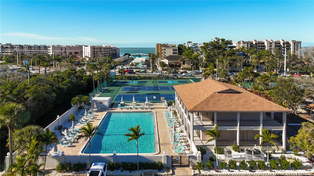 6415 Midnight Pass Road, Unit 705 Sarasota, FL 34242 - Photo 31 of 44 a view of a city and tall buildings