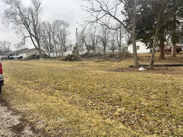 a view of yard covered with snow