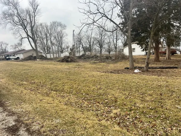 a view of yard covered with snow