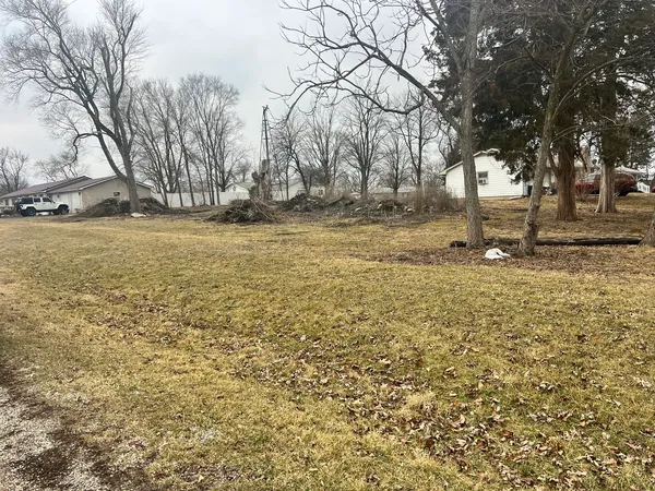 a view of yard covered with snow