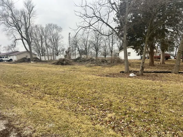 a view of yard covered with snow