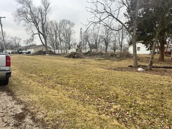 a view of yard covered with snow