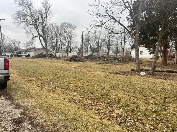 a view of open space with yard