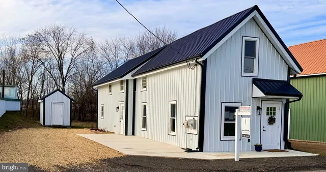 a front view of a house with garage