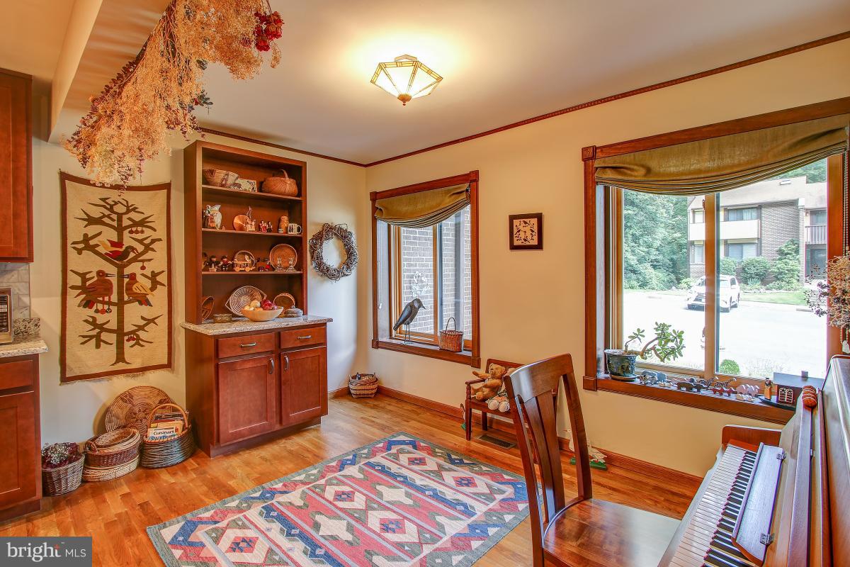 2170 Glencourse Lane Reston, VA 20191 - Photo 12 of 29 Expansive windows overlook garden