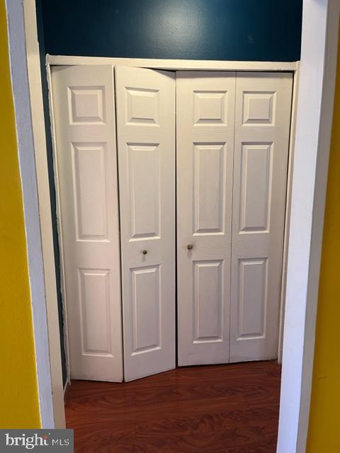 4721 1st Street Southwest, Unit 101 Washington, DC 20032 - Photo 14 of 15 an empty room with wooden floor