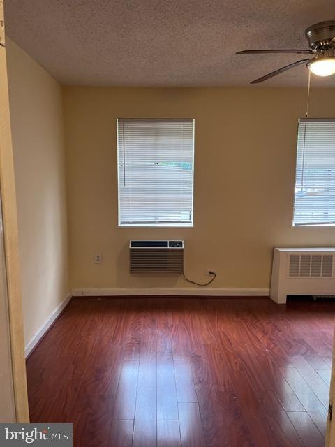 4721 1st Street Southwest, Unit 101 Washington, DC 20032 - Photo 7 of 15 a view of a room with wooden floor and a window