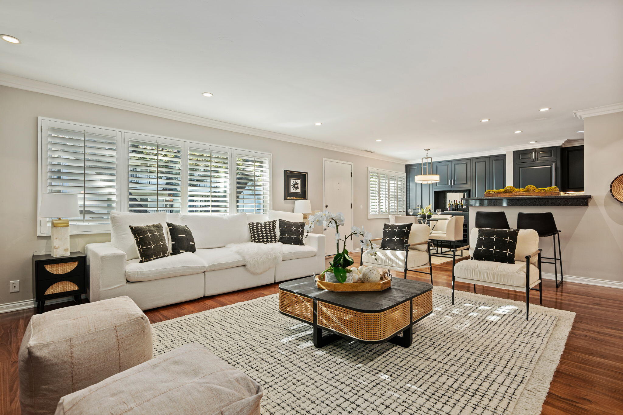 1701 Anacapa Street, Unit 9 Santa Barbara, CA 93101 - Photo 1 of 28 a living room with furniture wooden floor and a large window