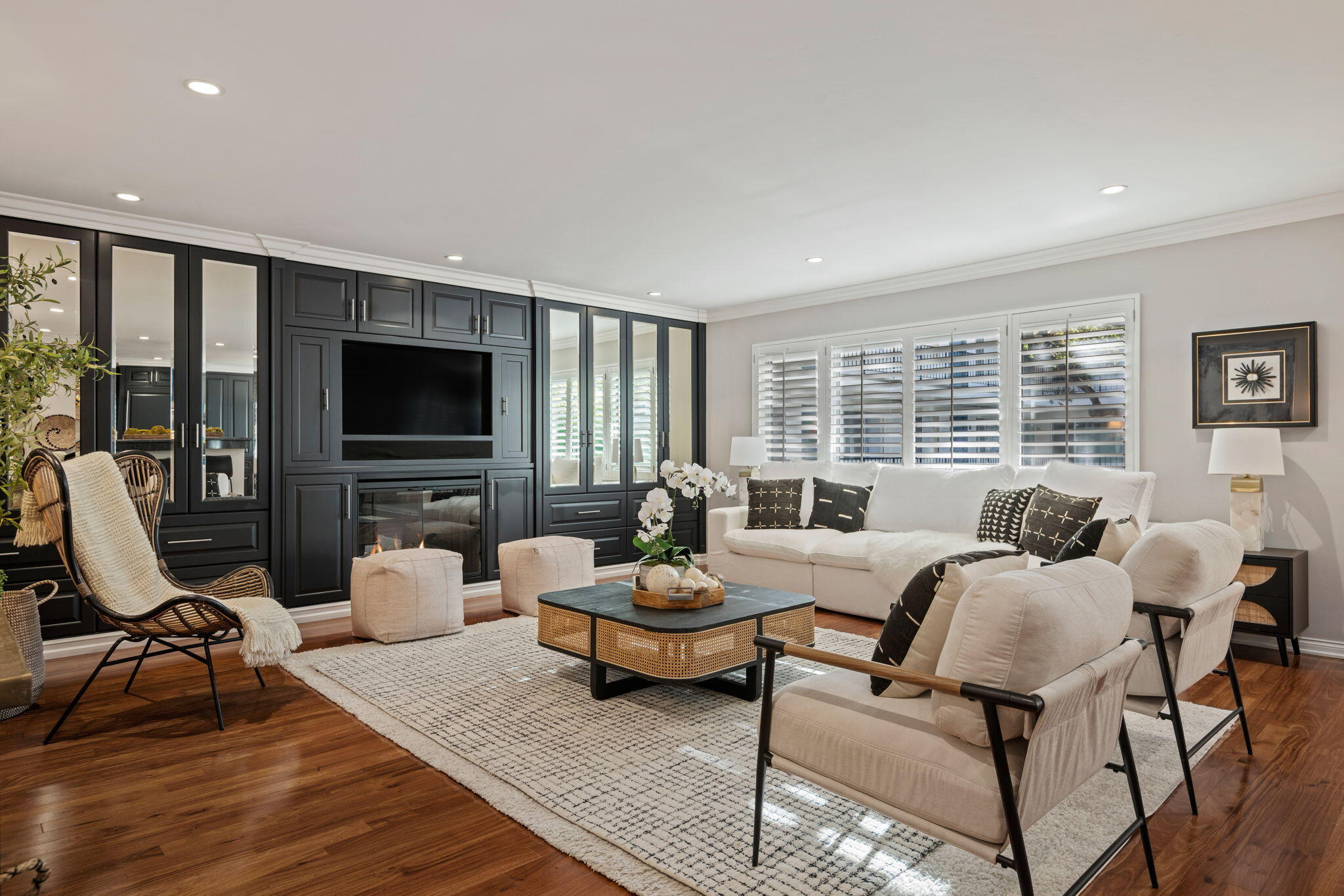 1701 Anacapa Street, Unit 9 Santa Barbara, CA 93101 - Photo 5 of 28 a living room with furniture a flat screen tv and a large window