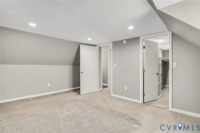 a view of storage and utility room with washer and dryer