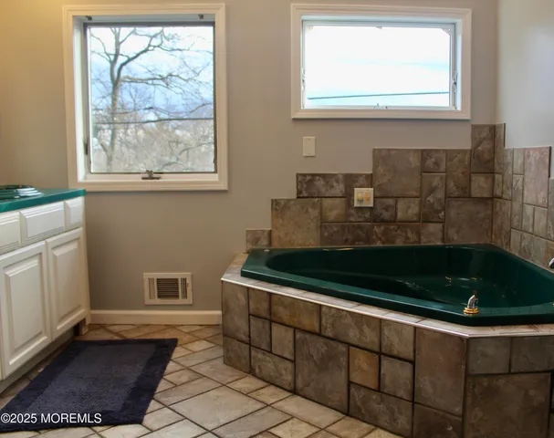 a view of a dinning table and chairs in the patio
