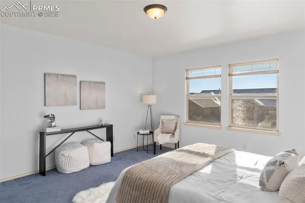 a bathroom with a tub sink mirror and a shower