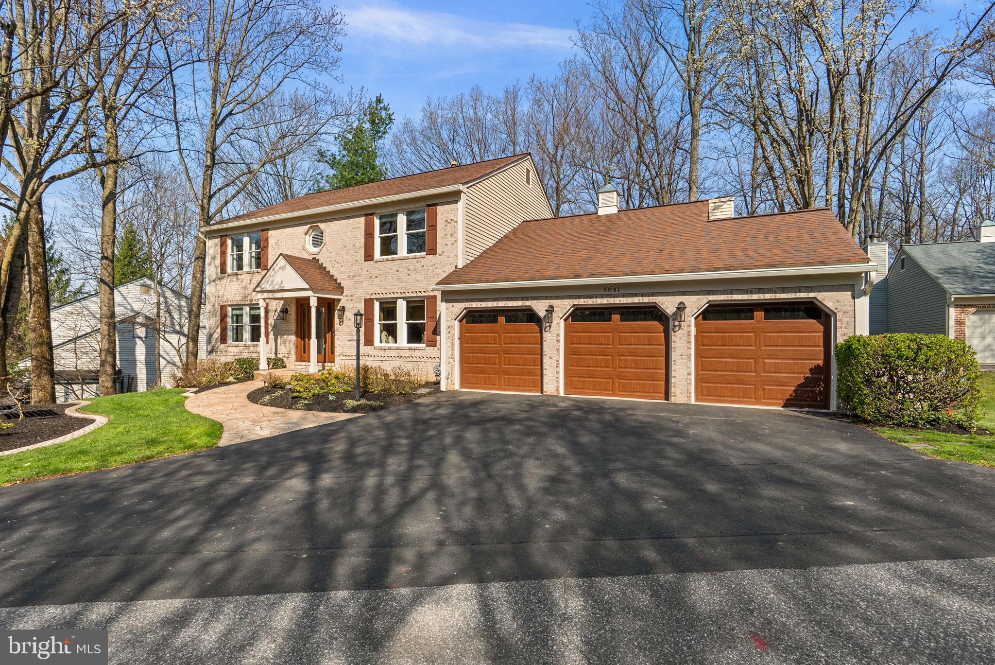 6841 Caravan Court Columbia, MD 21044 - Photo 2 of 41 Expansive 3 car garage and professional landscape
