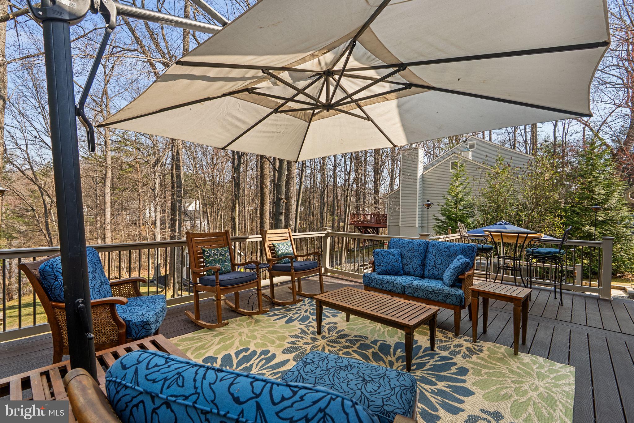 6841 Caravan Court Columbia, MD 21044 - Photo 34 of 41 Tranquil tree setting with Trex deck