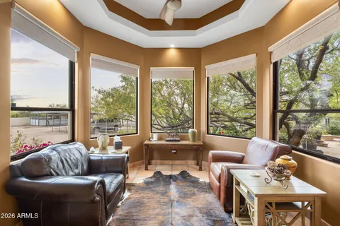 a view of an outdoor sitting area with furniture