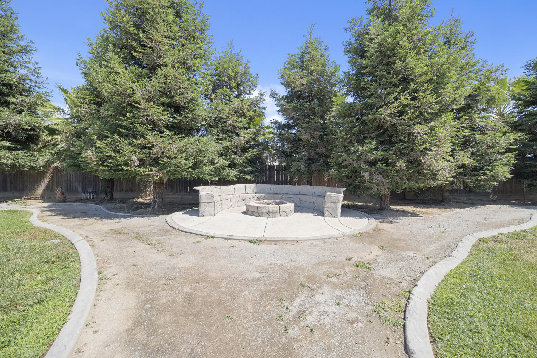 2208 West Benton Court Exeter, CA 93221 - Photo 67 of 84 67 - Back yard - Fire pit