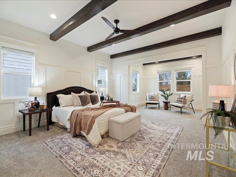 3882 West Haverhill Street Eagle, ID 83616 - Photo 22 of 41 Carpeted bedroom featuring a decorative wall, a ceiling fan, recessed lighting, and a wainscoted wall