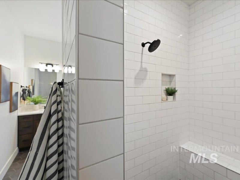 3882 West Haverhill Street Eagle, ID 83616 - Photo 25 of 41 Full bathroom with vanity and tiled shower