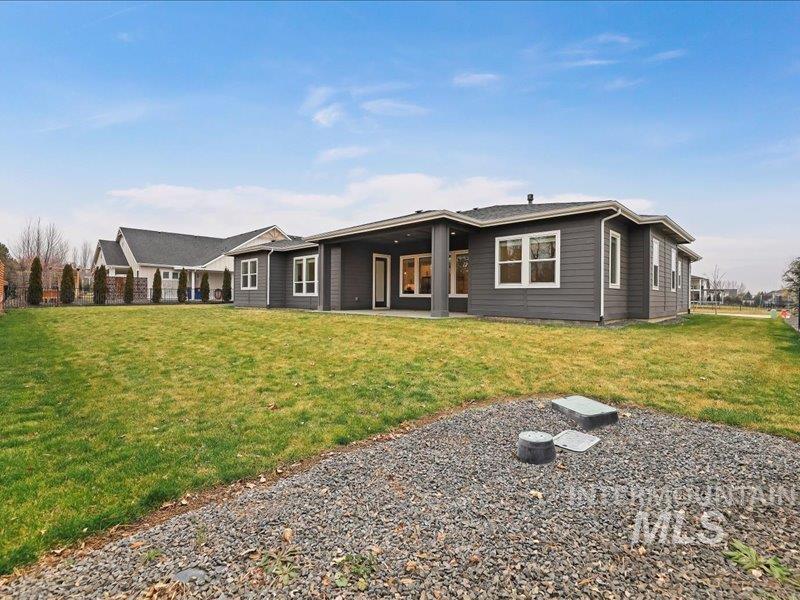 3882 West Haverhill Street Eagle, ID 83616 - Photo 41 of 41 View of front of home with a front lawn and a patio area