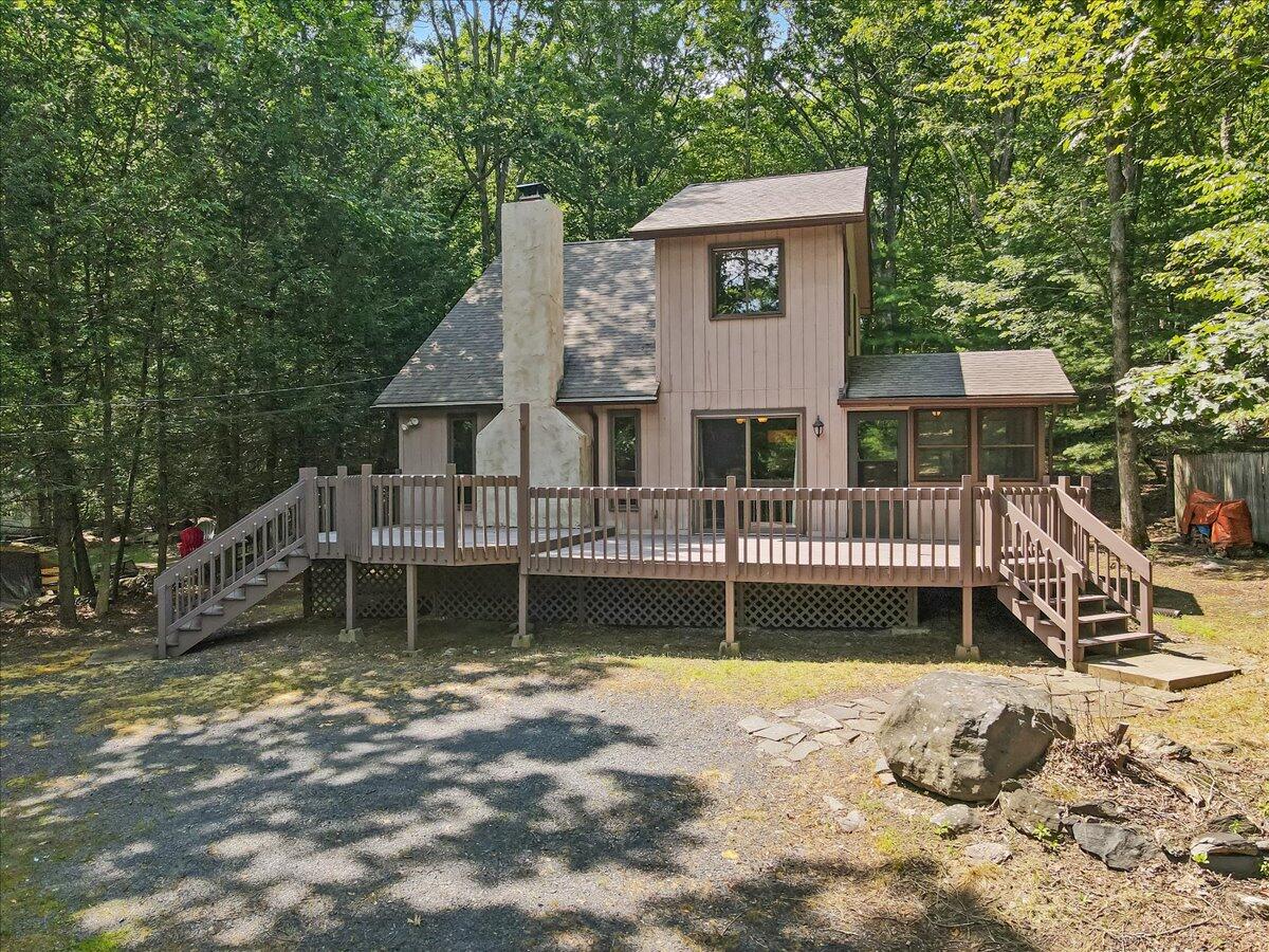 5913 Decker Road Bushkill, PA 18324 - Photo 4 of 53 a front view of a house with a yard