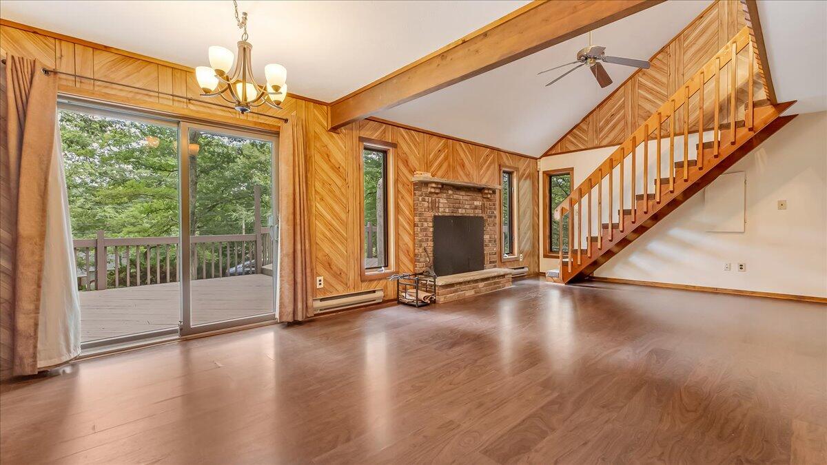 5913 Decker Road Bushkill, PA 18324 - Photo 10 of 53 a view of an entryway with wooden floor door and windows