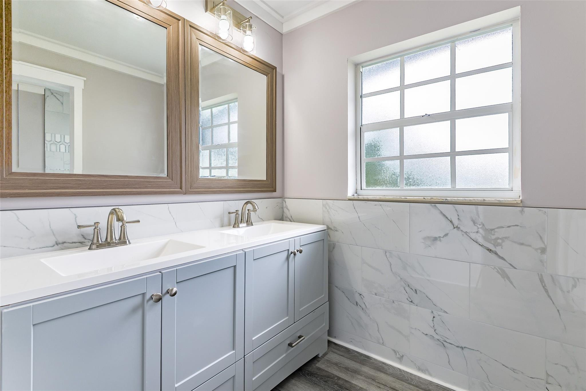 22500 Labrador Street Boca Raton, FL 33428 - Photo 21 of 30 a bathroom with a sink and a vanity