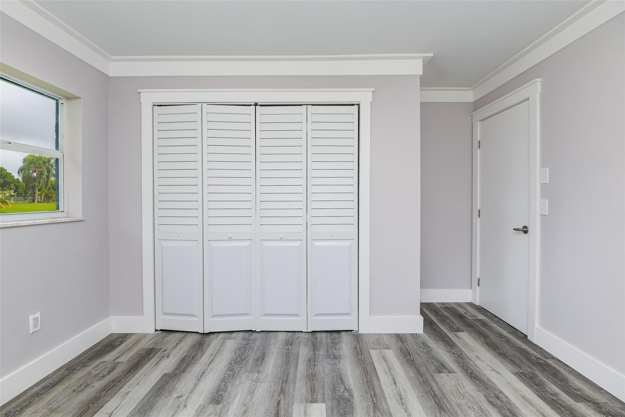 22500 Labrador Street Boca Raton, FL 33428 - Photo 25 of 30 a view of room with window and hardwood floor