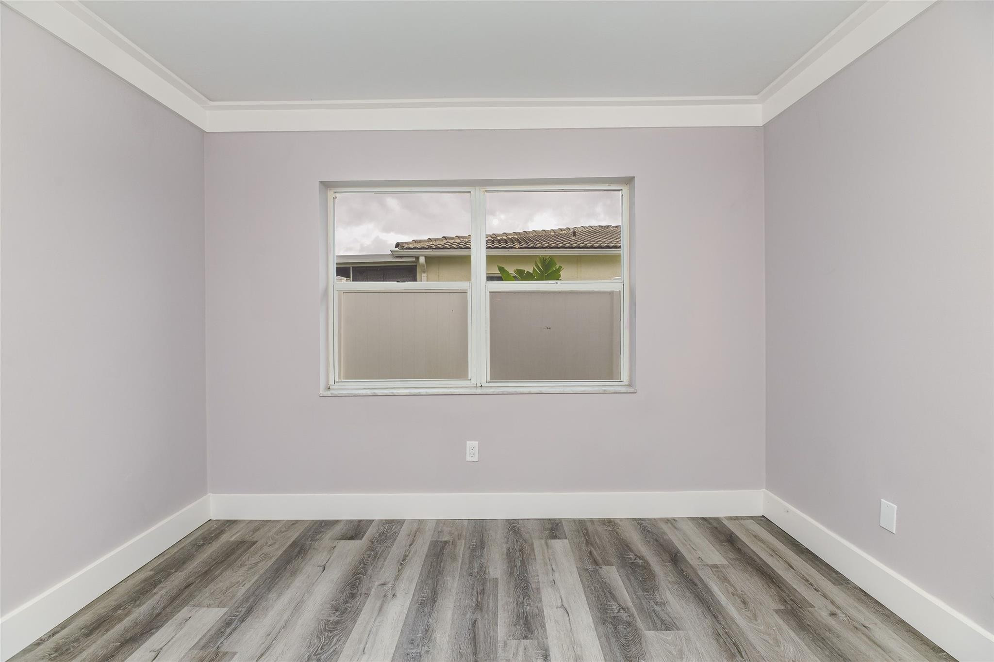 22500 Labrador Street Boca Raton, FL 33428 - Photo 28 of 30 a view of an empty room with a window