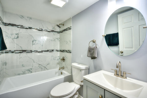 1330 Taney Place Gary, IN 46404 - Photo 13 of 19 a bathroom with a sink toilet and shower