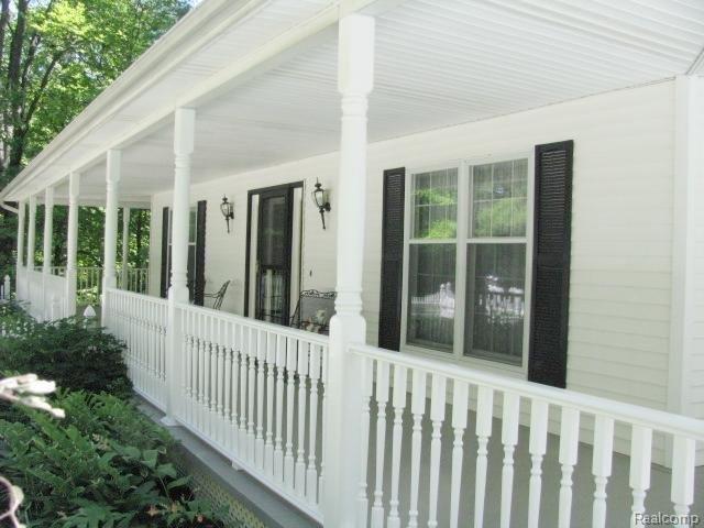 5770 Havens Road Dryden, MI 48428 - Photo 20 of 25 19 Wrap around Porch.jpg