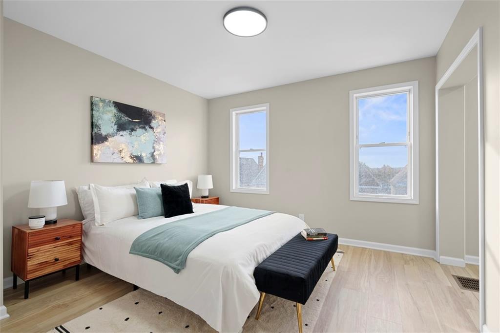 411 Kambach Street Pittsburgh, PA 15211 - Photo 21 of 47 Spacious Master Bedroom features high ceilings, excellent natural light, bonus sitting room/office, LPV flooring, and large closet!