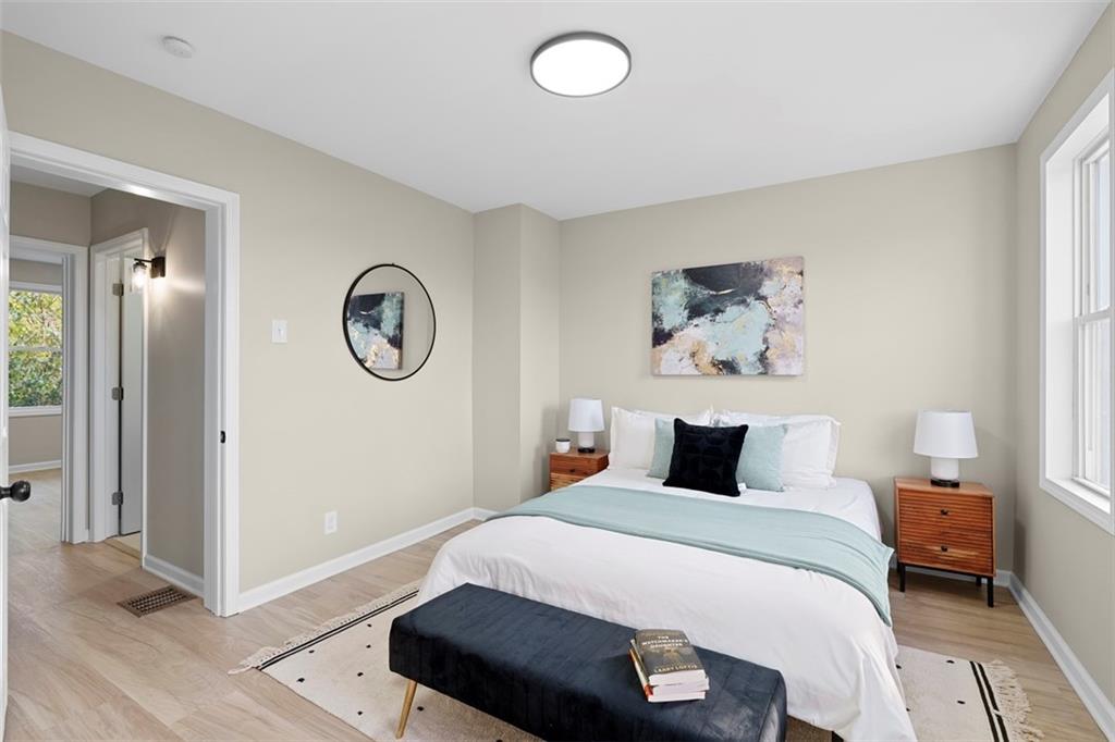 411 Kambach Street Pittsburgh, PA 15211 - Photo 22 of 47 Spacious Master Bedroom features high ceilings, excellent natural light, bonus sitting room/office, LPV flooring, and large closet!