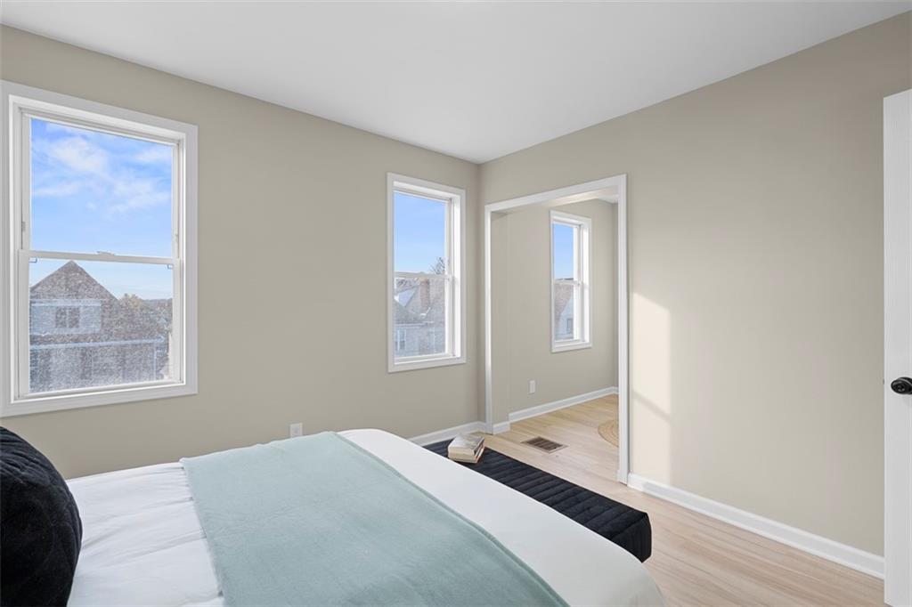 411 Kambach Street Pittsburgh, PA 15211 - Photo 23 of 47 Spacious Master Bedroom features high ceilings, excellent natural light, bonus sitting room/office, LPV flooring, and large closet!