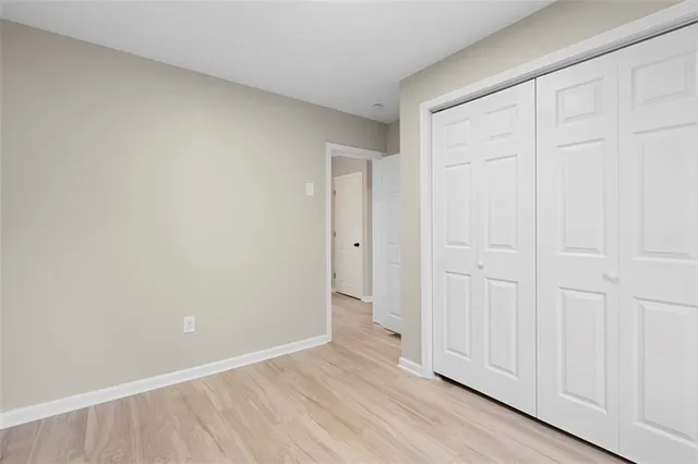 a bathroom with a shower and a sink
