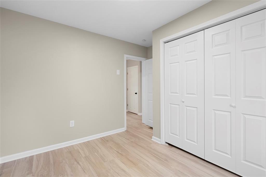 411 Kambach Street Pittsburgh, PA 15211 - Photo 26 of 47 Spacious 2nd Bedroom features high ceilings, excellent natural light, LPV flooring, and large closet!