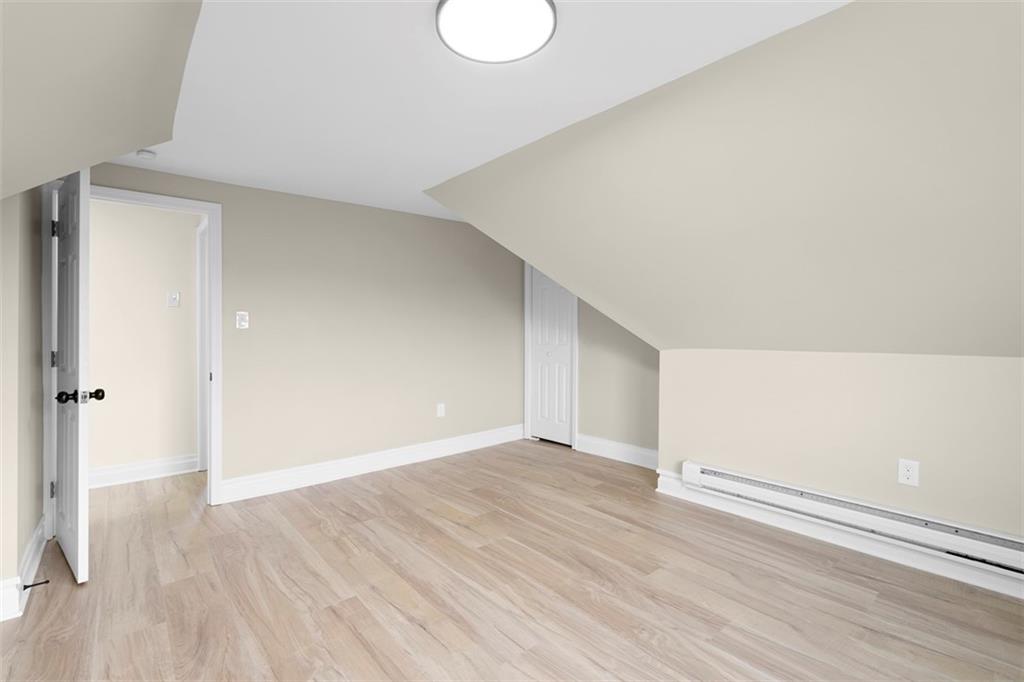 411 Kambach Street Pittsburgh, PA 15211 - Photo 31 of 47 Spacious 3rd Bedroom features high ceilings, excellent natural light, LPV flooring, and large closet!