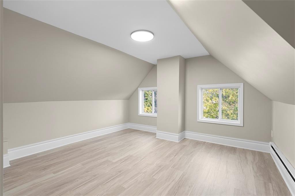 411 Kambach Street Pittsburgh, PA 15211 - Photo 32 of 47 Spacious 3rd fl flex room features high ceilings, excellent natural light, LPV flooring, and large closet! Perfect for office, entertainment den, home gym or 4th bedroom/guest room!