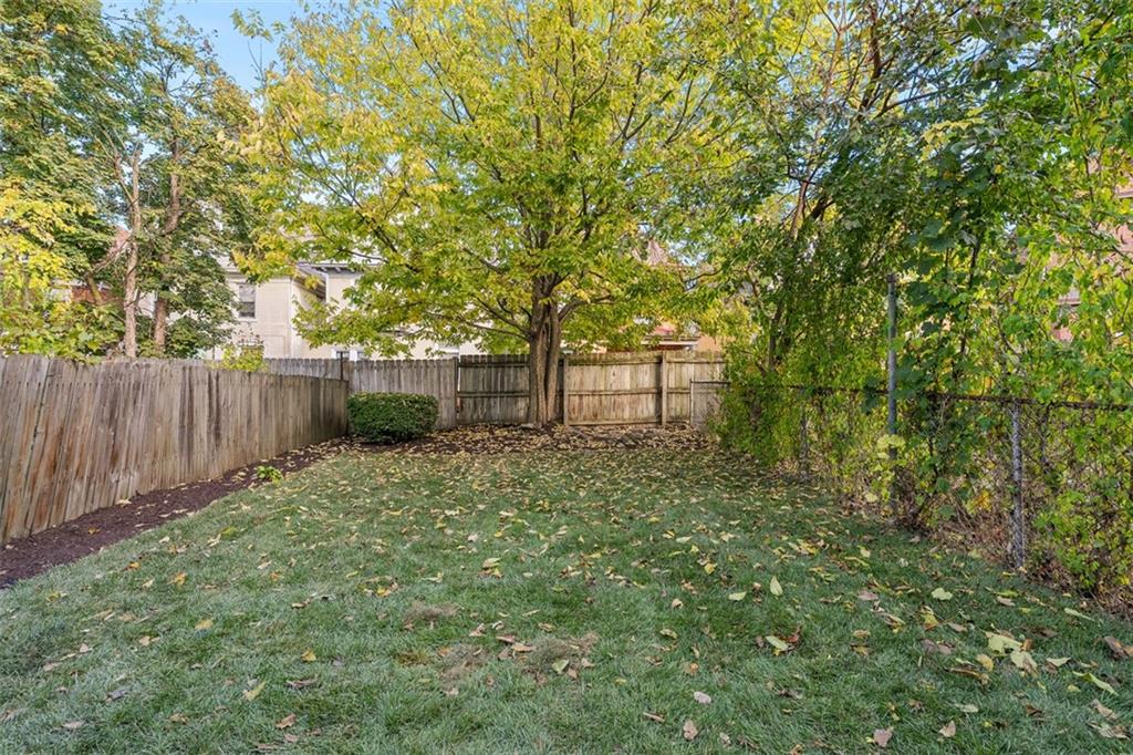 411 Kambach Street Pittsburgh, PA 15211 - Photo 38 of 47 Lovely outdoor living space features quaint deck off of Dining Room, large greenspace backyard w/endless landscaping/gardening possibilities!