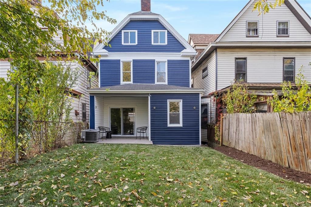 411 Kambach Street Pittsburgh, PA 15211 - Photo 39 of 47 Lovely outdoor living space features quaint deck off of Dining Room, large greenspace backyard w/endless landscaping/gardening possibilities!